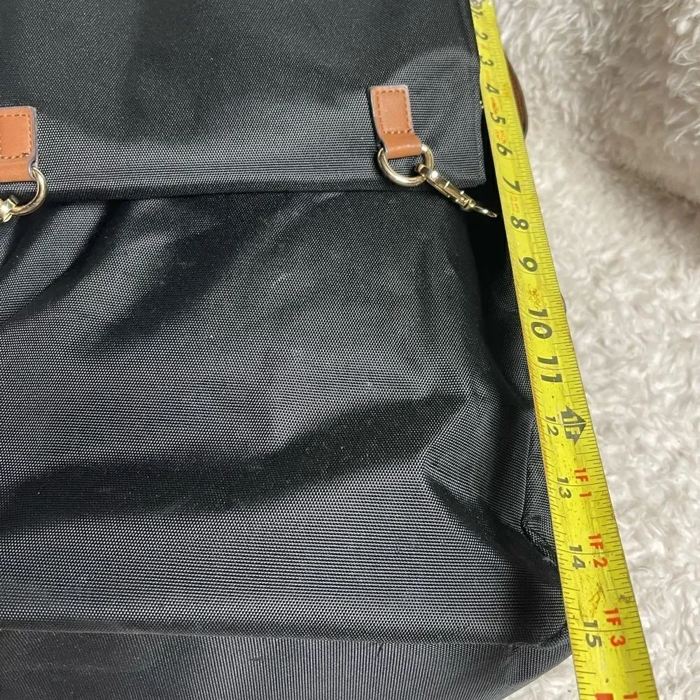 Tommy Bahama Black Laptop Case Backpack With Brown trims and straps .